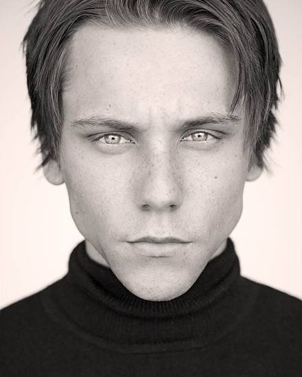 Black and white theatrical actor headshot photographed by Headshots LA